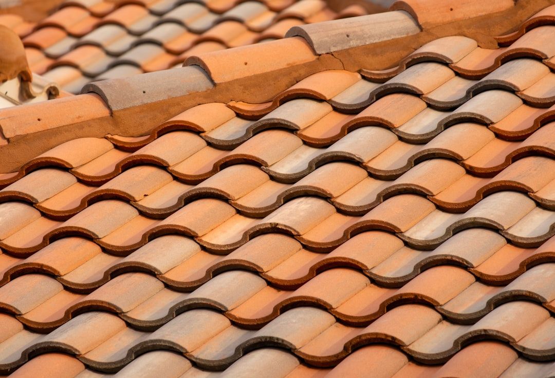 Premium barrel clay tile roof on a high-end residence